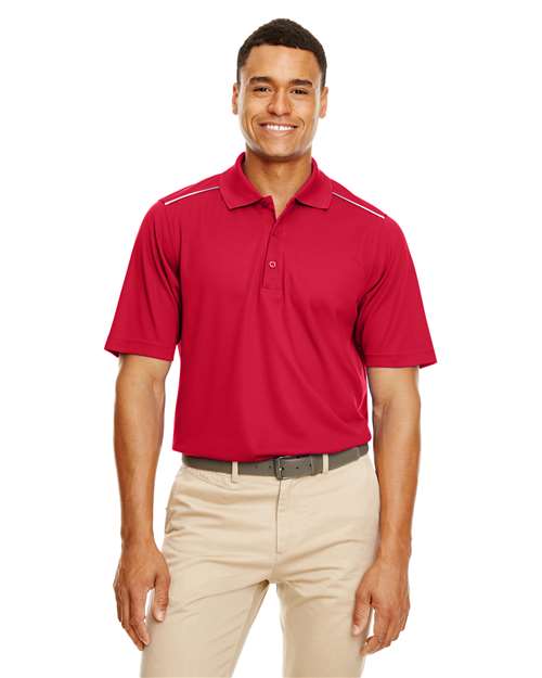 A classic red men’s CORE365 Radiant Performance piqué polo featuring a classic collar and short sleeves with reflective piping accents for added visibility. Designed with moisture-wicking fabric, it offers a sleek, athletic fit suitable for both casual wear and active use.