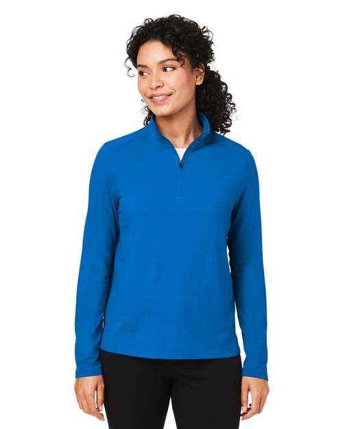 Devon & Jones Women’s Raleigh stretch quarter-zip pullover with a sleek, modern fit and soft, flexible fabric. Features a zip-up collar and comfortable stretch design, ideal for layering or everyday wear.