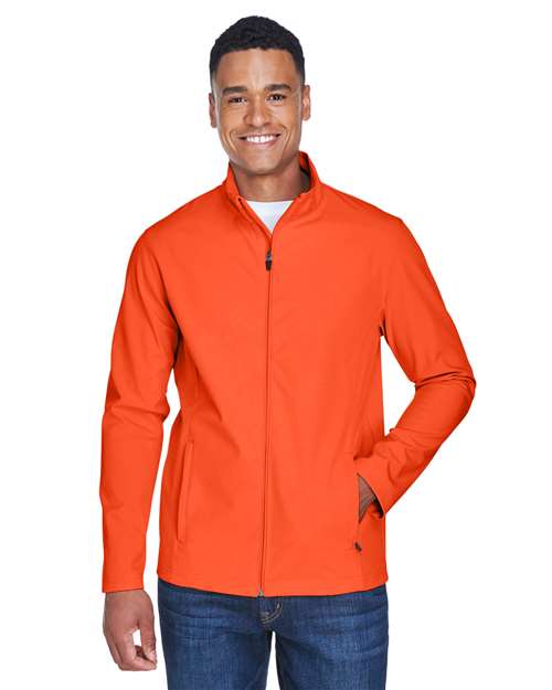 Team 365 Men’s Leader soft shell jacket with a sleek, weather-resistant design and modern fit. Features a full-zip front and durable fabric, ideal for outdoor wear and layering.