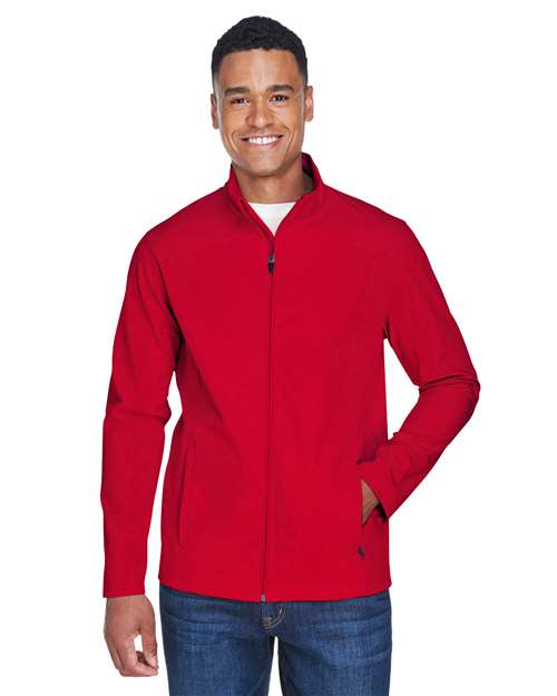Team 365 Men’s Leader soft shell jacket with a sleek, weather-resistant design and modern fit. Features a full-zip front and durable fabric, ideal for outdoor wear and layering.
