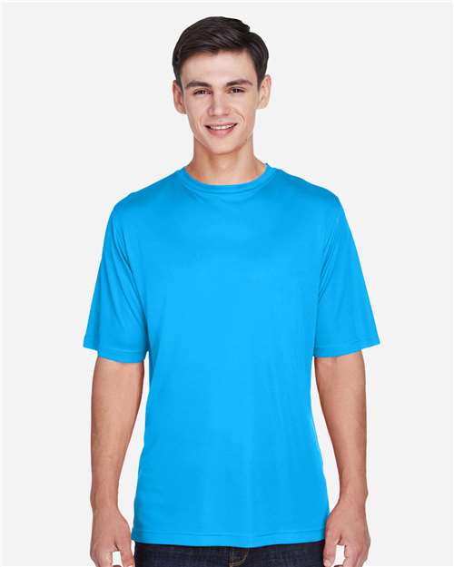 Team 365 Men’s Zone Performance t-shirt with a lightweight, breathable design and athletic fit. Features moisture-wicking fabric, ideal for workouts, sports, or everyday wear.