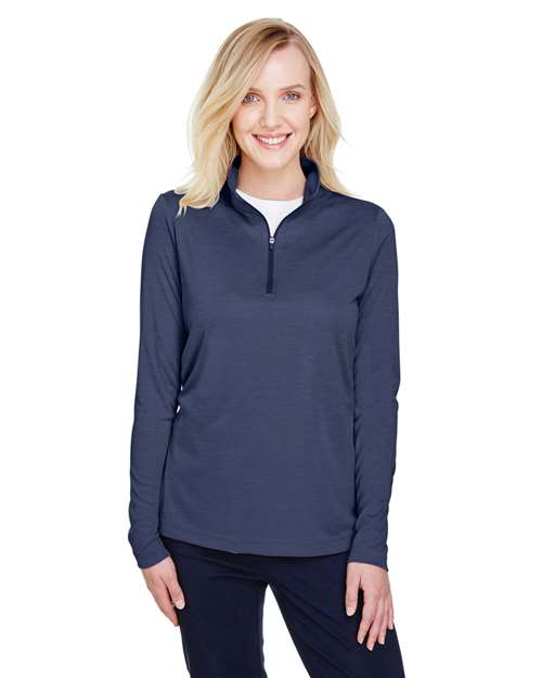 Team 365 Women’s Zone Sonic Heather performance quarter-zip pullover with a lightweight, athletic fit and heathered texture. Features moisture-wicking fabric and a zip-up collar, perfect for layering during workouts or casual wear.