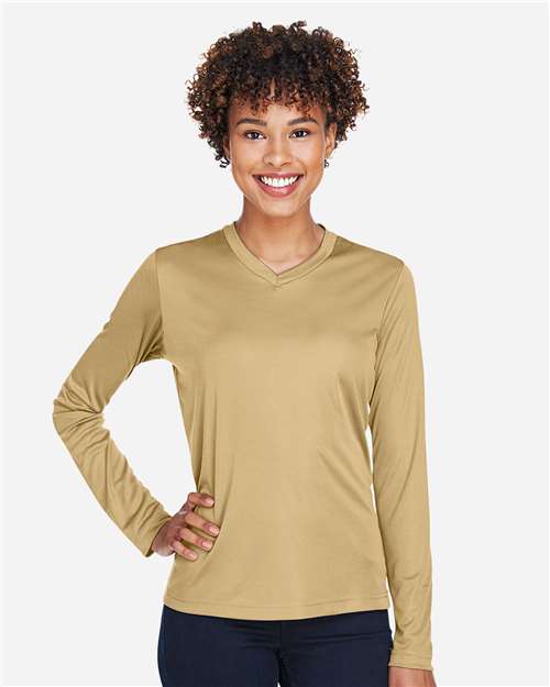 Team 365 Women’s Zone Performance long sleeve t-shirt with a lightweight, breathable design and flattering athletic fit. Features moisture-wicking fabric, making it ideal for workouts, layering, or everyday active wear.