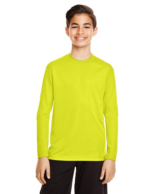 Team 365 Youth Zone Performance long sleeve t-shirt with a lightweight, breathable design and athletic fit. Features moisture-wicking fabric, making it ideal for sports, school, or everyday active wear.