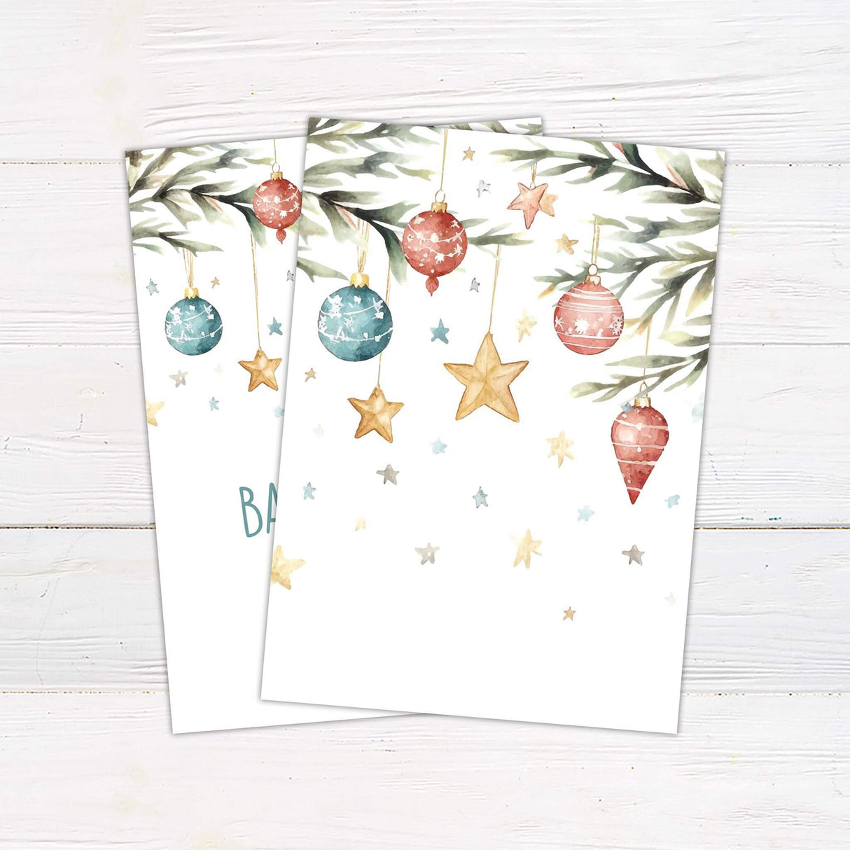 Christmas baby shower invitation with watercolor ornaments and pine branches on a white background, ideal for winter-themed celebrations.