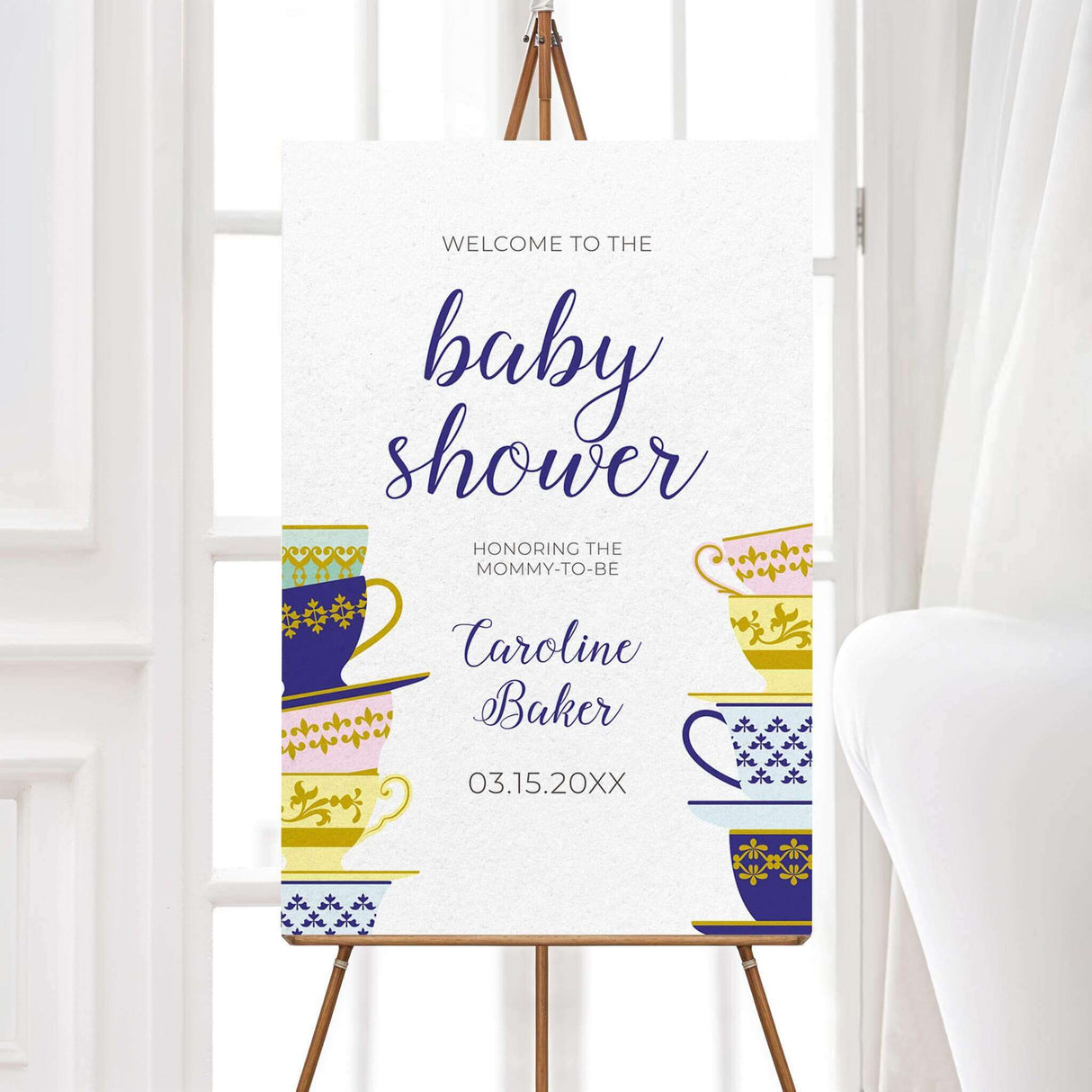 A Spot of Tea baby shower welcome sign featuring an elegant stack of colorful teacups with gold and blue patterns. The design includes delicate script typography with customizable text for the honoree’s name, event date, time, and venue. Perfect for a tea party-themed baby shower, afternoon tea, or high tea celebration. Professionally printed on premium cardstock with matching envelopes included.