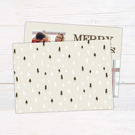 Minimalist Christmas photo card with two photo frames, bold "Merry Christmas" text, and customizable family name and year. - back.