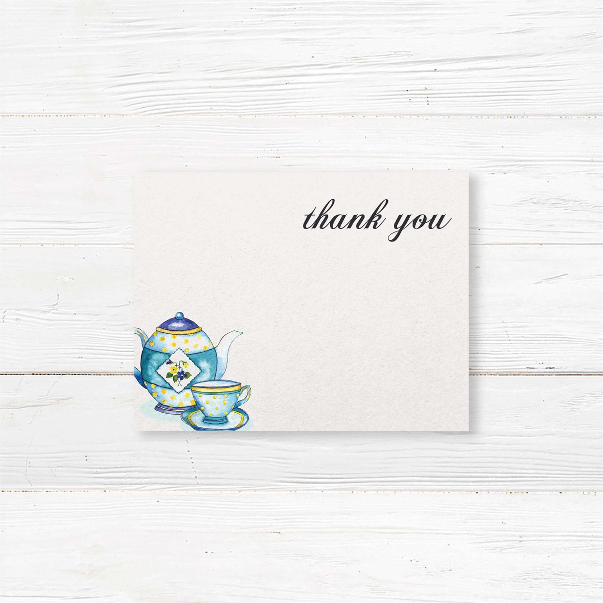Elegant bridal tea thank you card with a coordinating watercolor teapot and teacup design. Features a heartfelt message and space for a personal note.