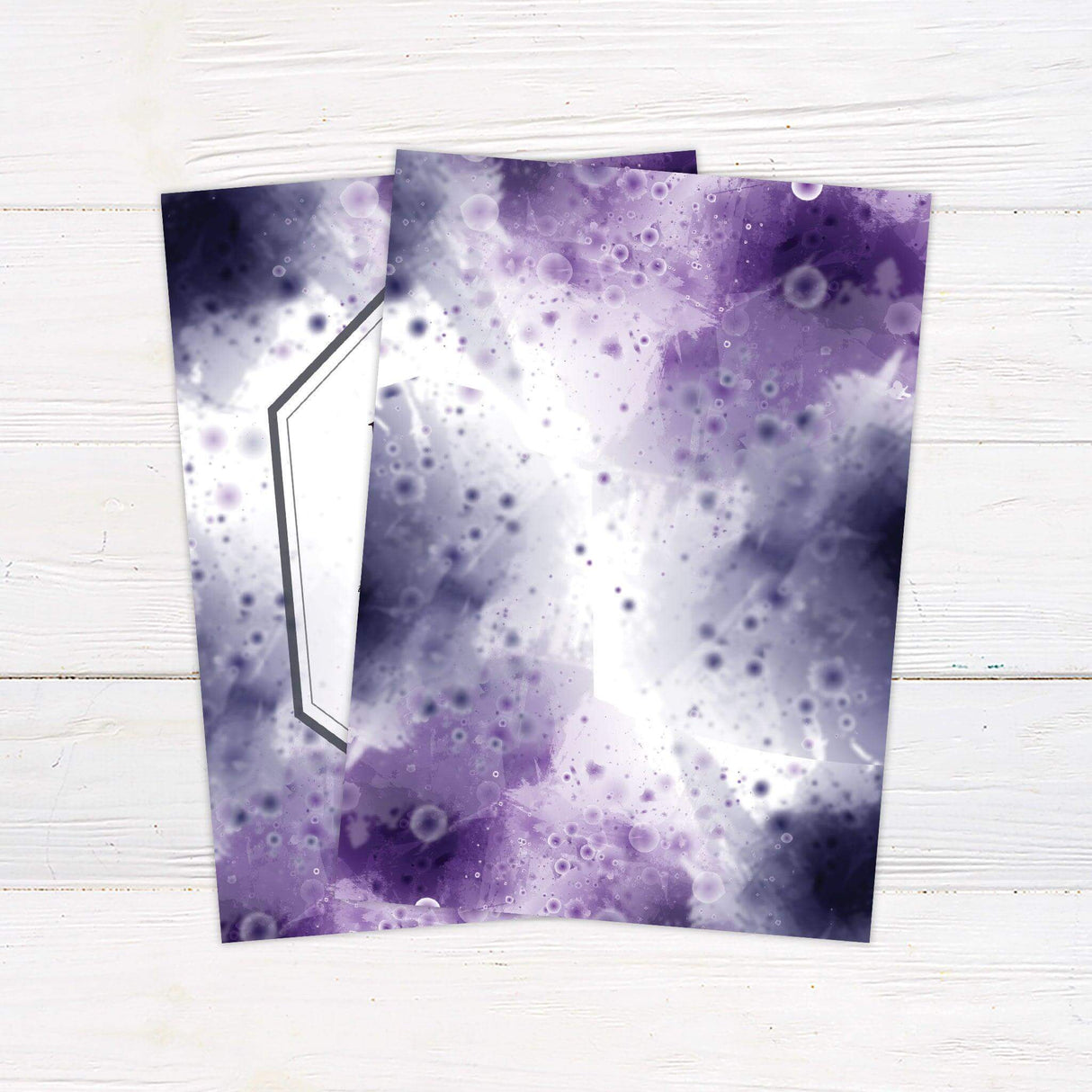 Wedding invitation with vibrant purple and blue watercolor splash background and white geometric frame. back