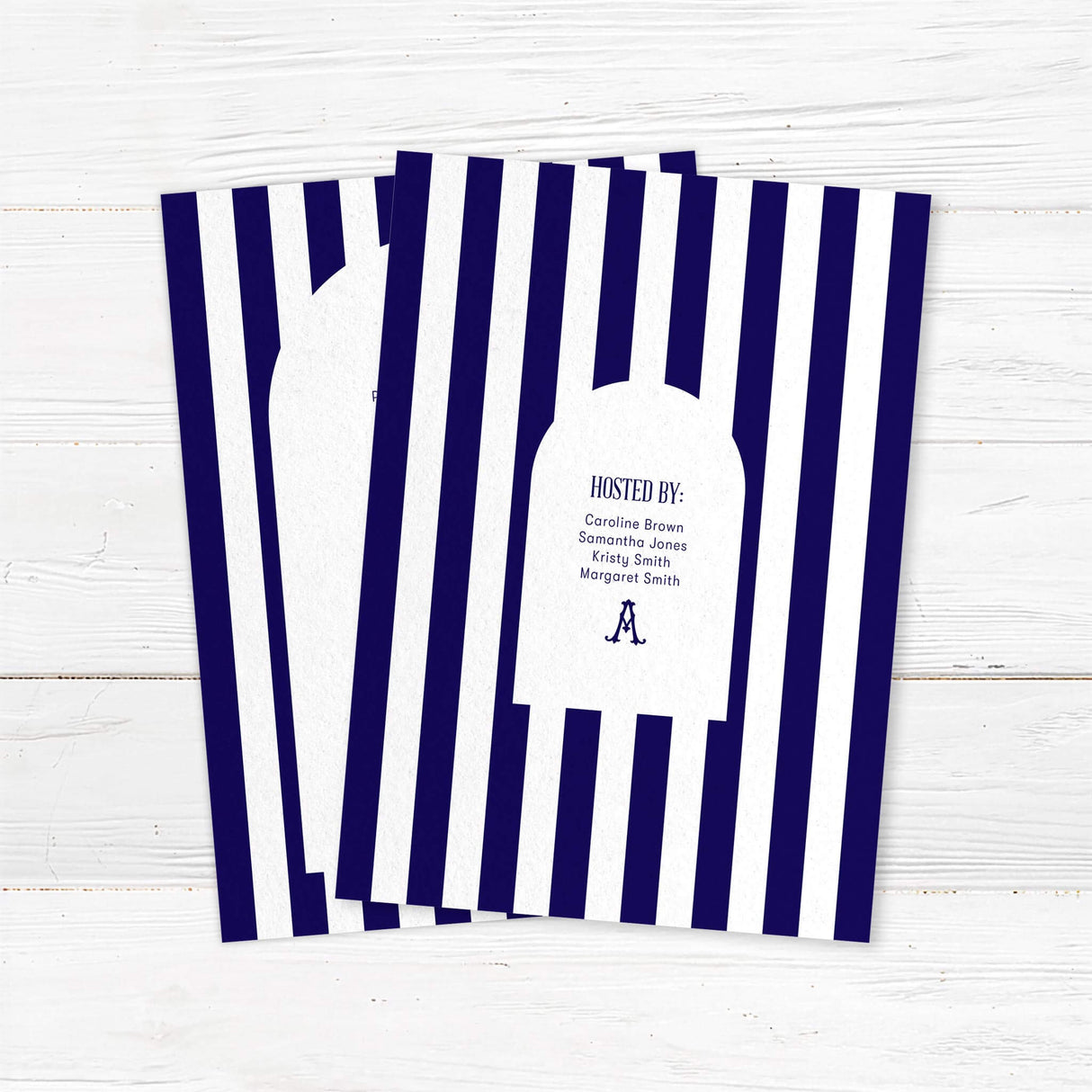 Bridal shower welcome sign with navy and white vertical stripes, antique serif monogram, elegant modern script and serif fonts, and a white arch panel to welcome guests in style. - back side