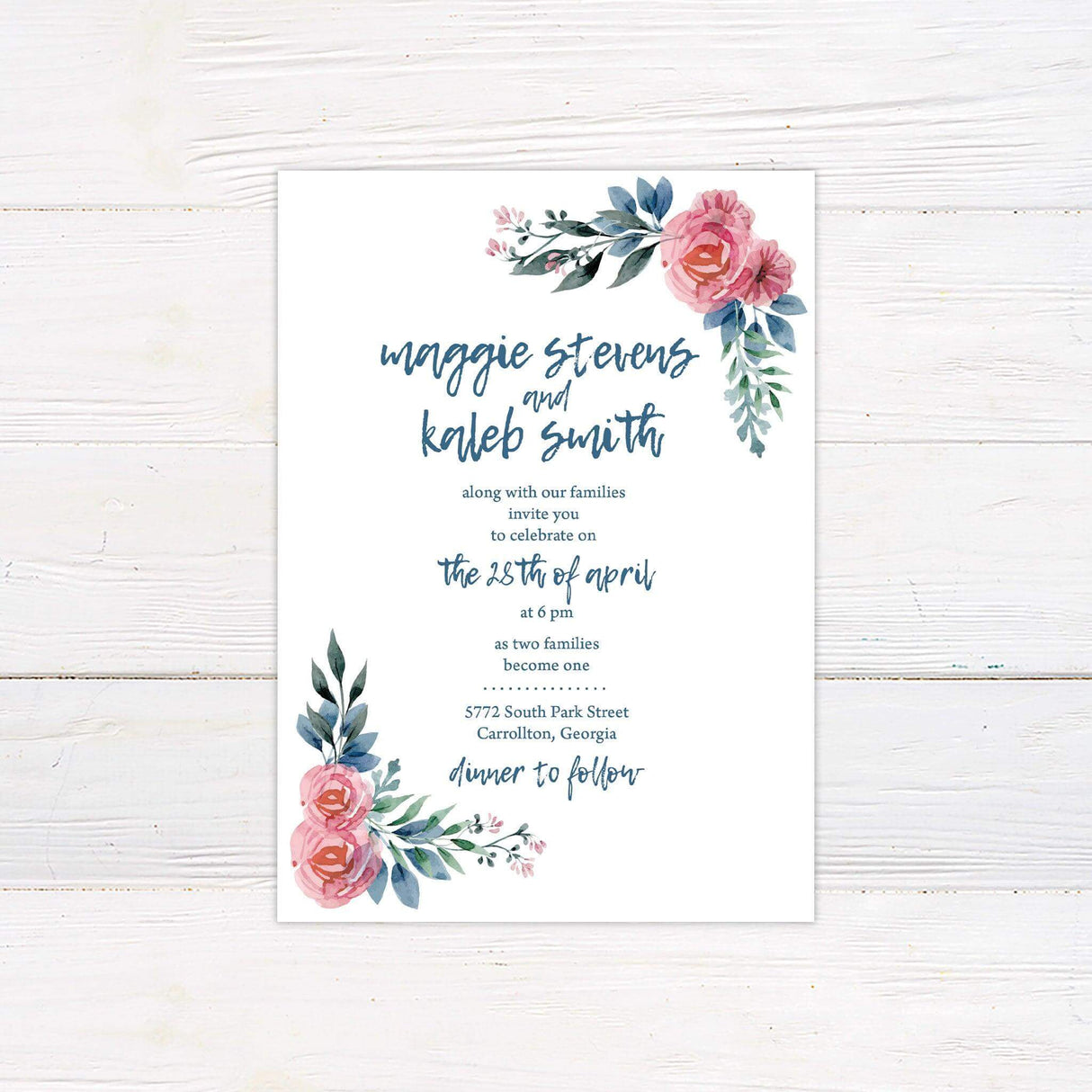 April wedding invitation with pink roses, greenery, and blue handwritten script on a white background – ideal for spring or garden-themed weddings.