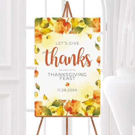 Autumn Leaves Give Thanks invitation featuring colorful fall leaves and "Let's Give Thanks" message for Thanksgiving feast.