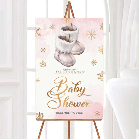 Pink baby shower invitation with boots and snowflakes design