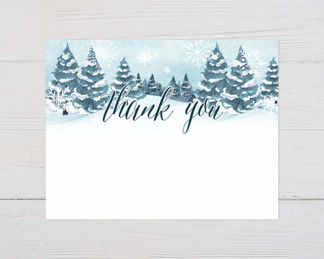 Winter thank you card with snow-covered trees and "thank you" text, perfect for a baby it's cold outside themed baby shower.