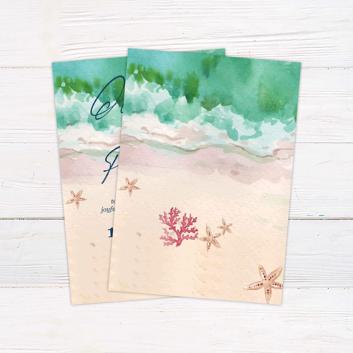 Beach wedding invitation with watercolor waves, soft sand, and starfish, featuring elegant script and serif fonts—ideal for destination weddings. back