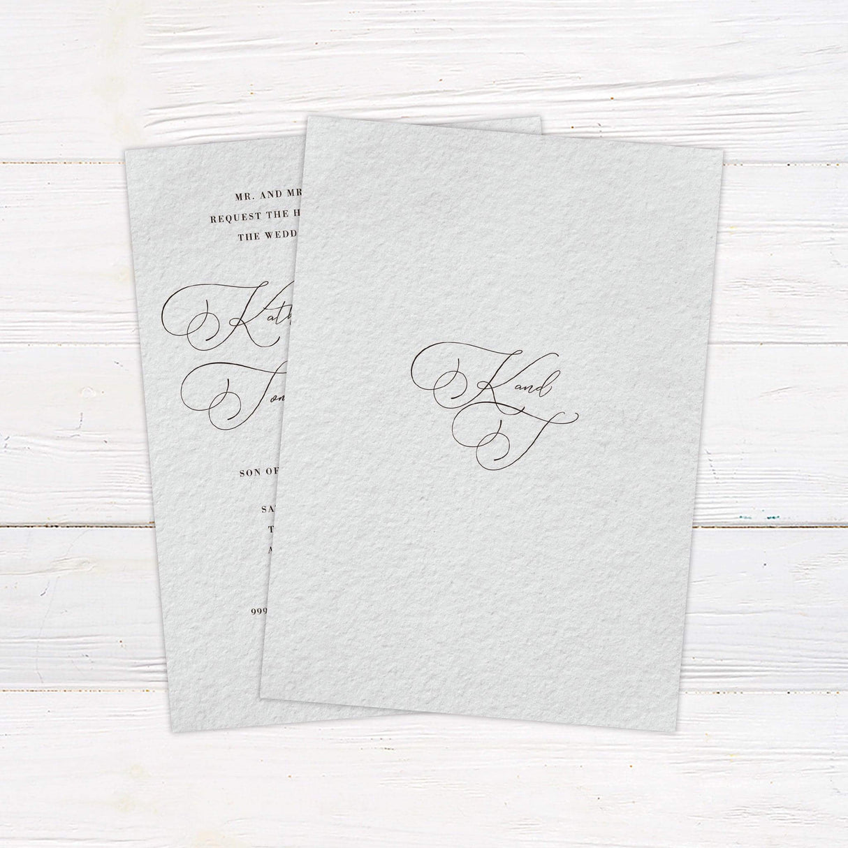 Elegant wedding invitation with formal serif text and ornate handwritten script on soft textured paper—perfect for classic or black-tie weddings. back