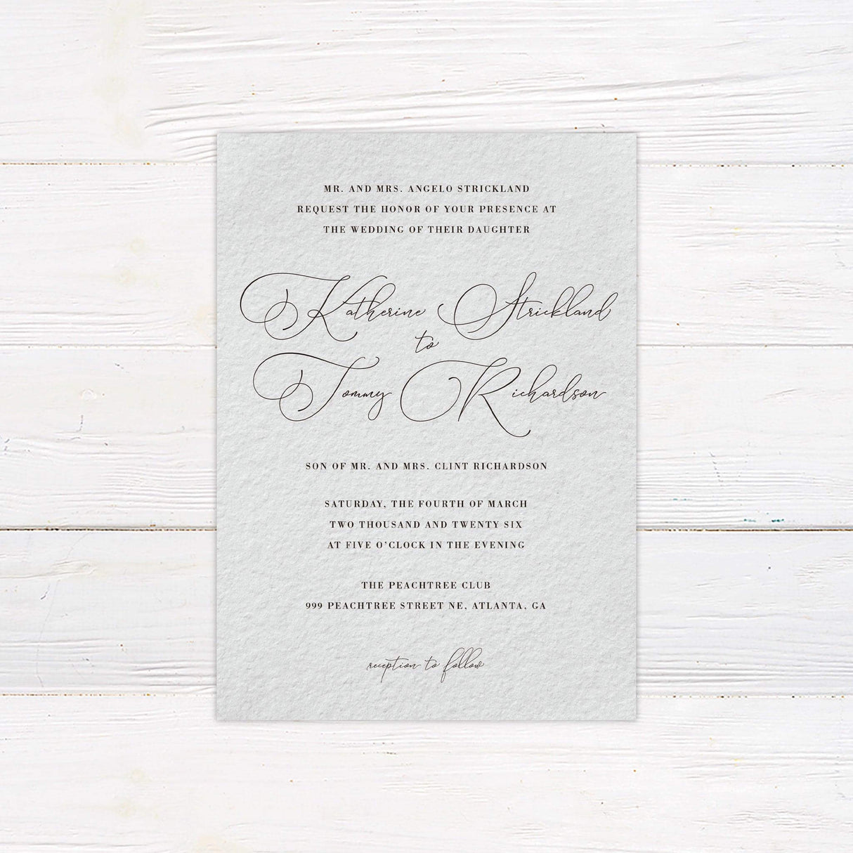 Elegant wedding invitation with formal serif text and ornate handwritten script on soft textured paper—perfect for classic or black-tie weddings.