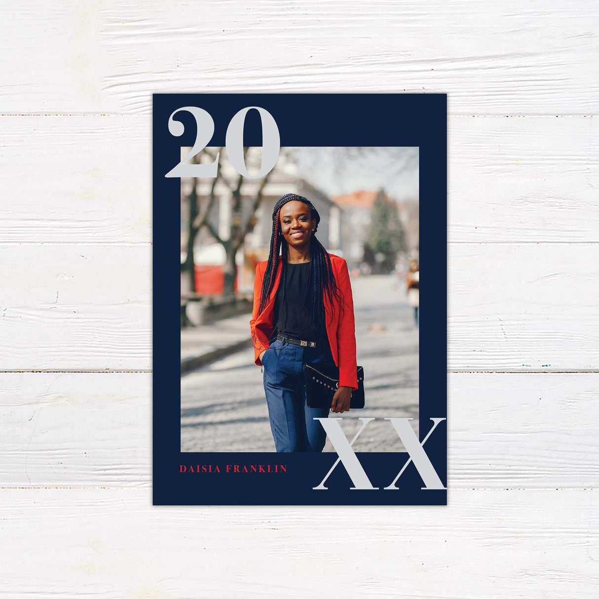 Stylish graduation invitation featuring a bold graduation year design. The back is customizable with school pride colors and includes party or graduation details. Navy and Red.