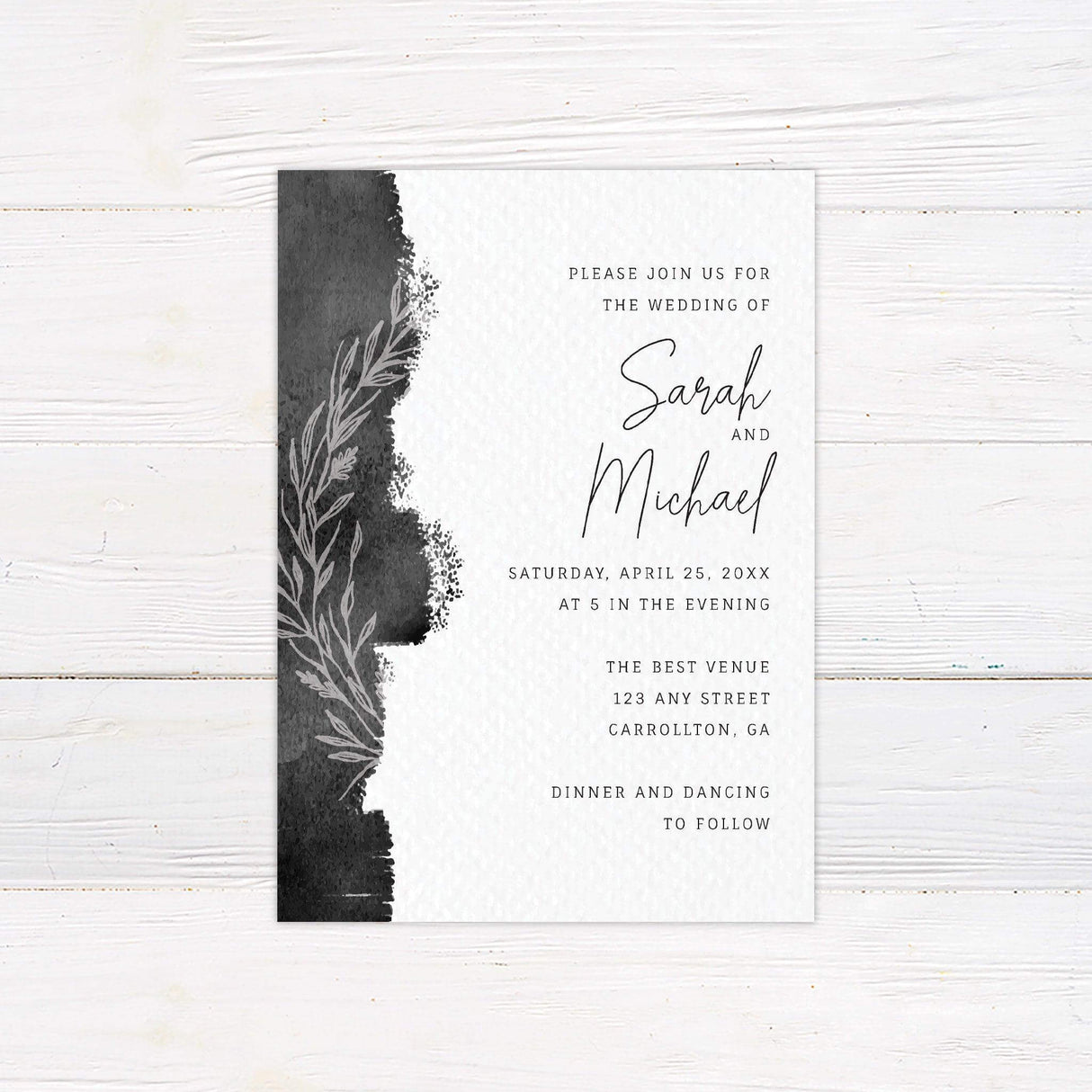 Modern black watercolor wedding invitation with minimalist botanical design, featuring elegant script and serif text for customizable wedding details.