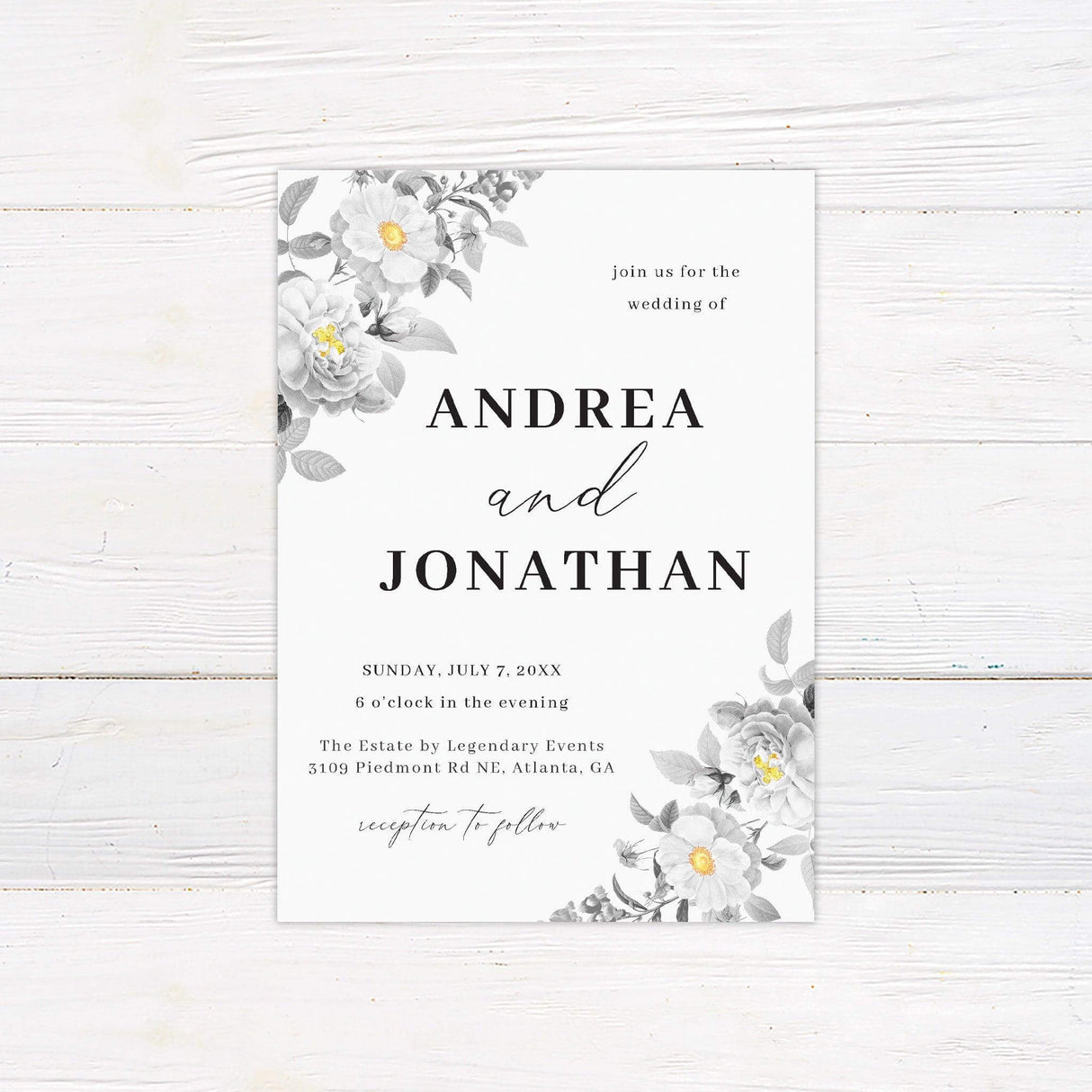 Botanical wedding invitation with black and white floral illustrations and soft yellow centers, modern serif and script fonts on a light background.