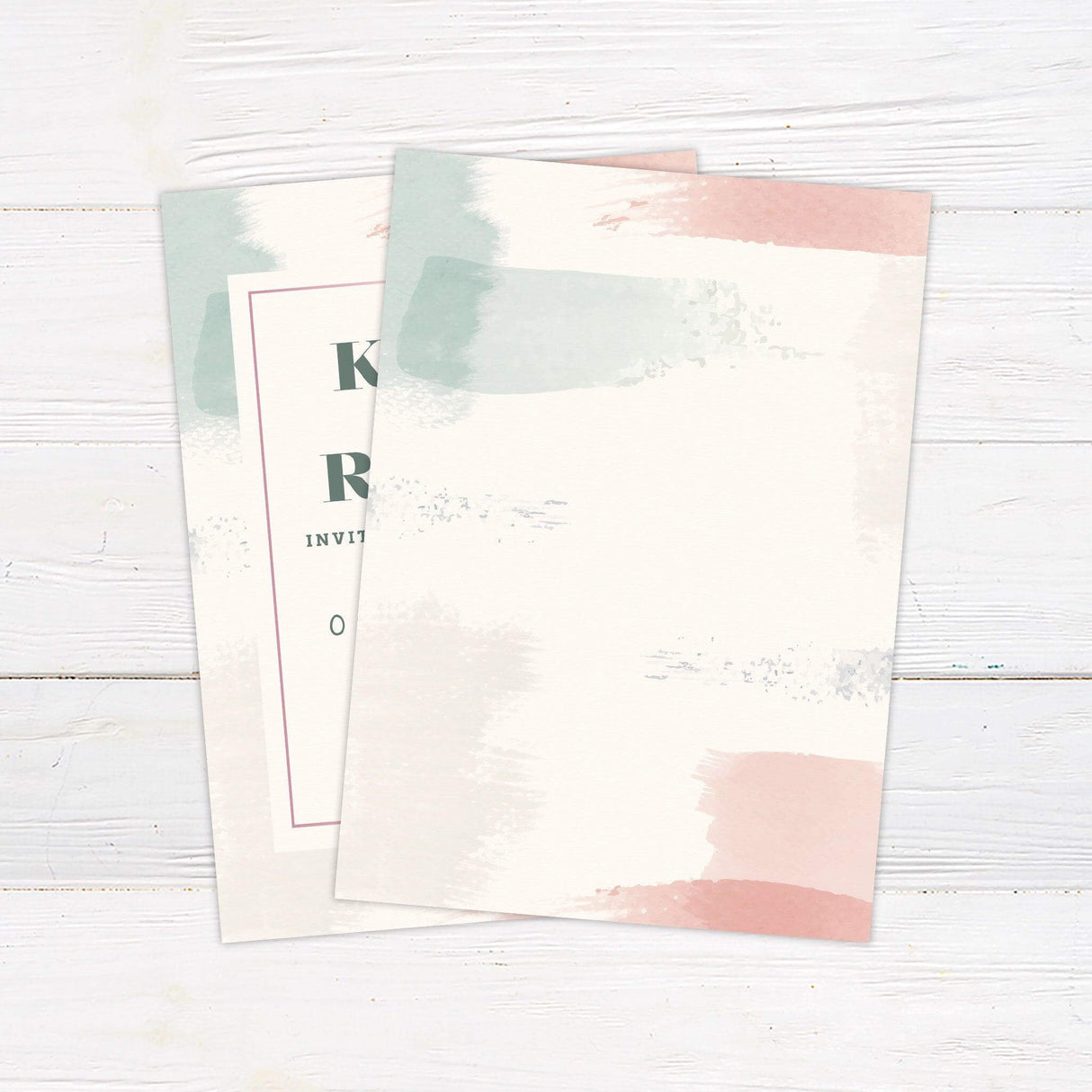 Watercolor wedding invitation with mint green, blush pink, and pastel brushstrokes featuring modern text layout. back