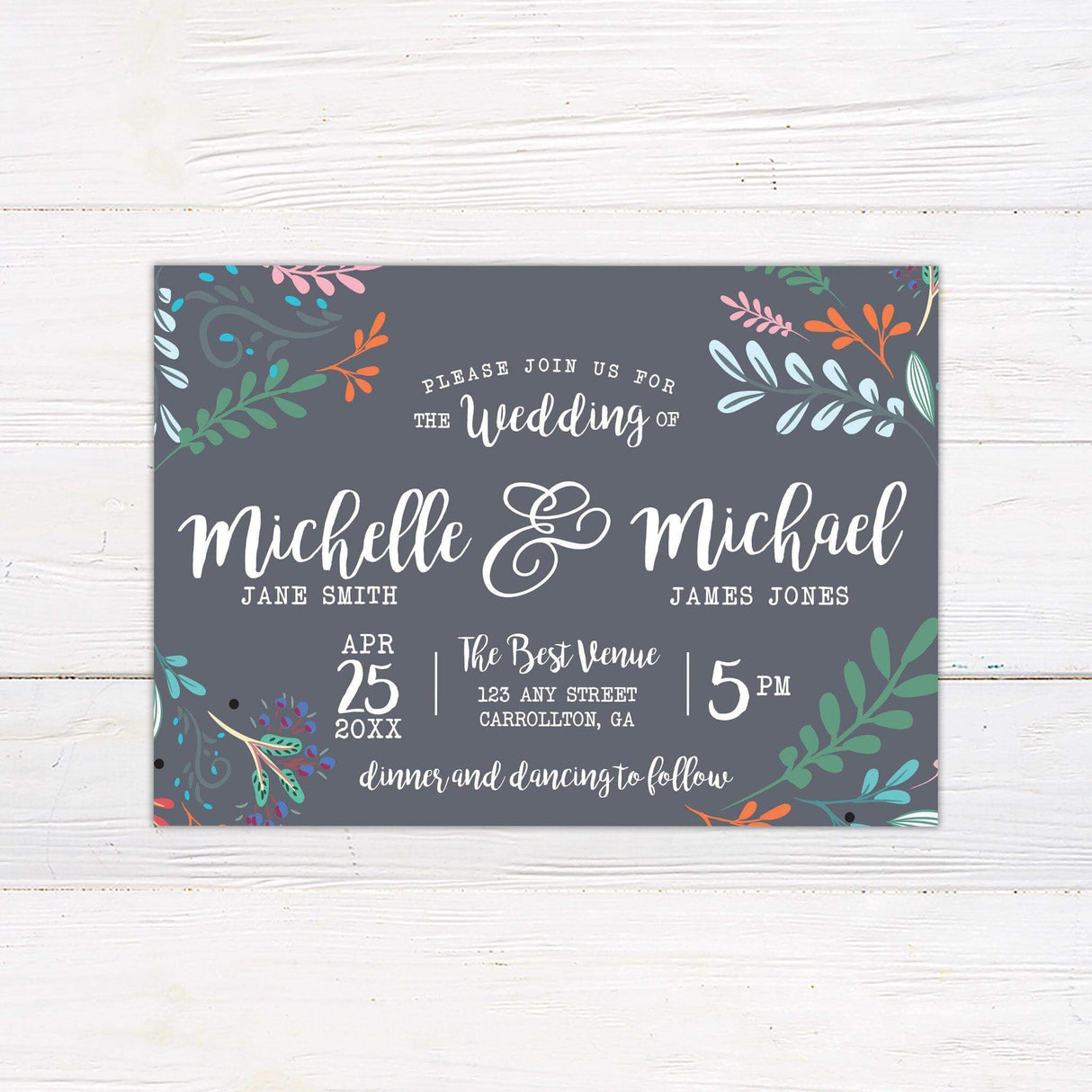 Rustic wedding invitation with navy blue background and colorful floral accents featuring playful typograph