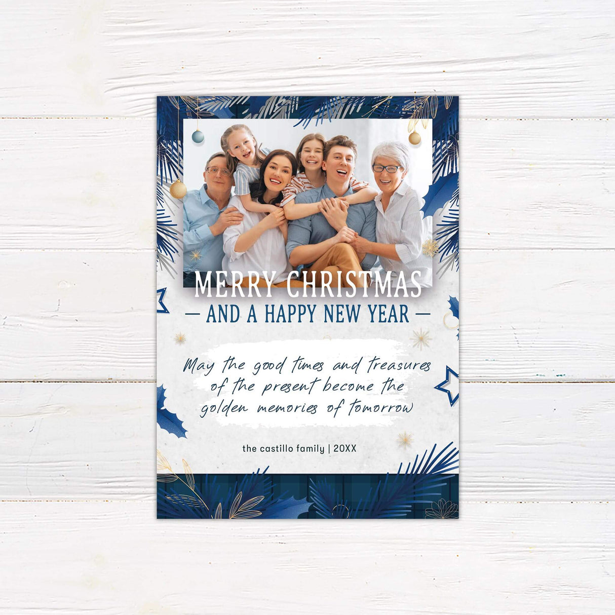 Blue Christmas photo card with gold accents, customizable family photo, and festive holiday greeting message.