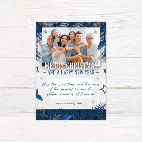 Blue Christmas photo card with gold accents, customizable family photo, and festive holiday greeting message.