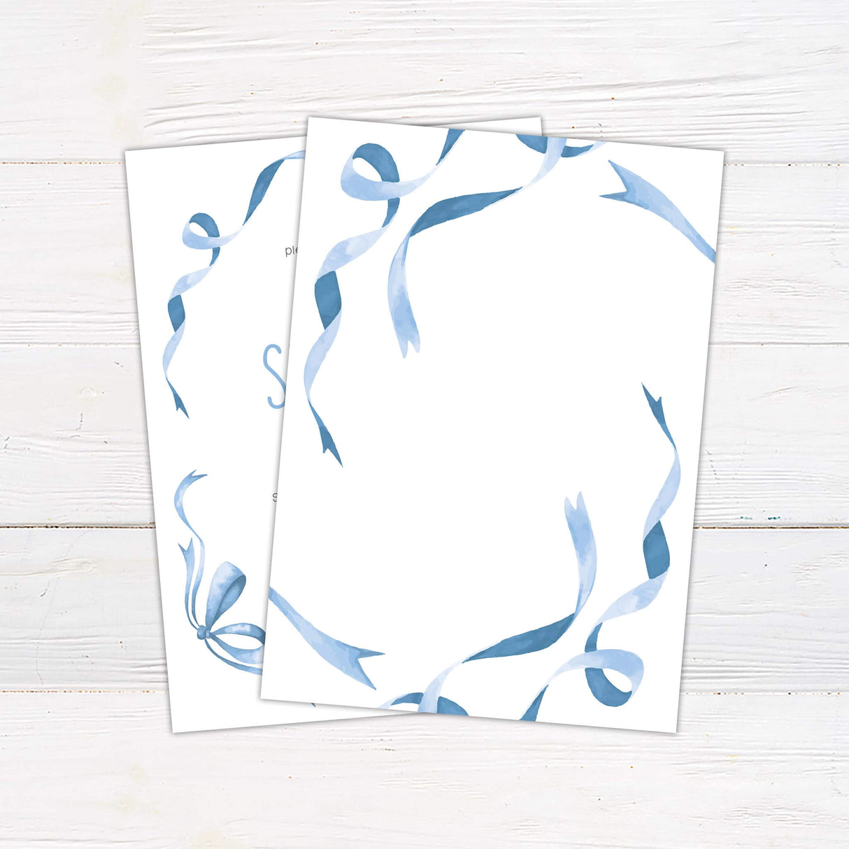 Elegant baby shower invitation featuring a soft watercolor design with flowing blue ribbons. The text is arranged in a stylish, modern font, inviting guests to celebrate the mom-to-be. Includes event details such as date, time, location, RSVP information, and gift registry. A beautiful choice for a classic and sophisticated baby shower theme. Back.