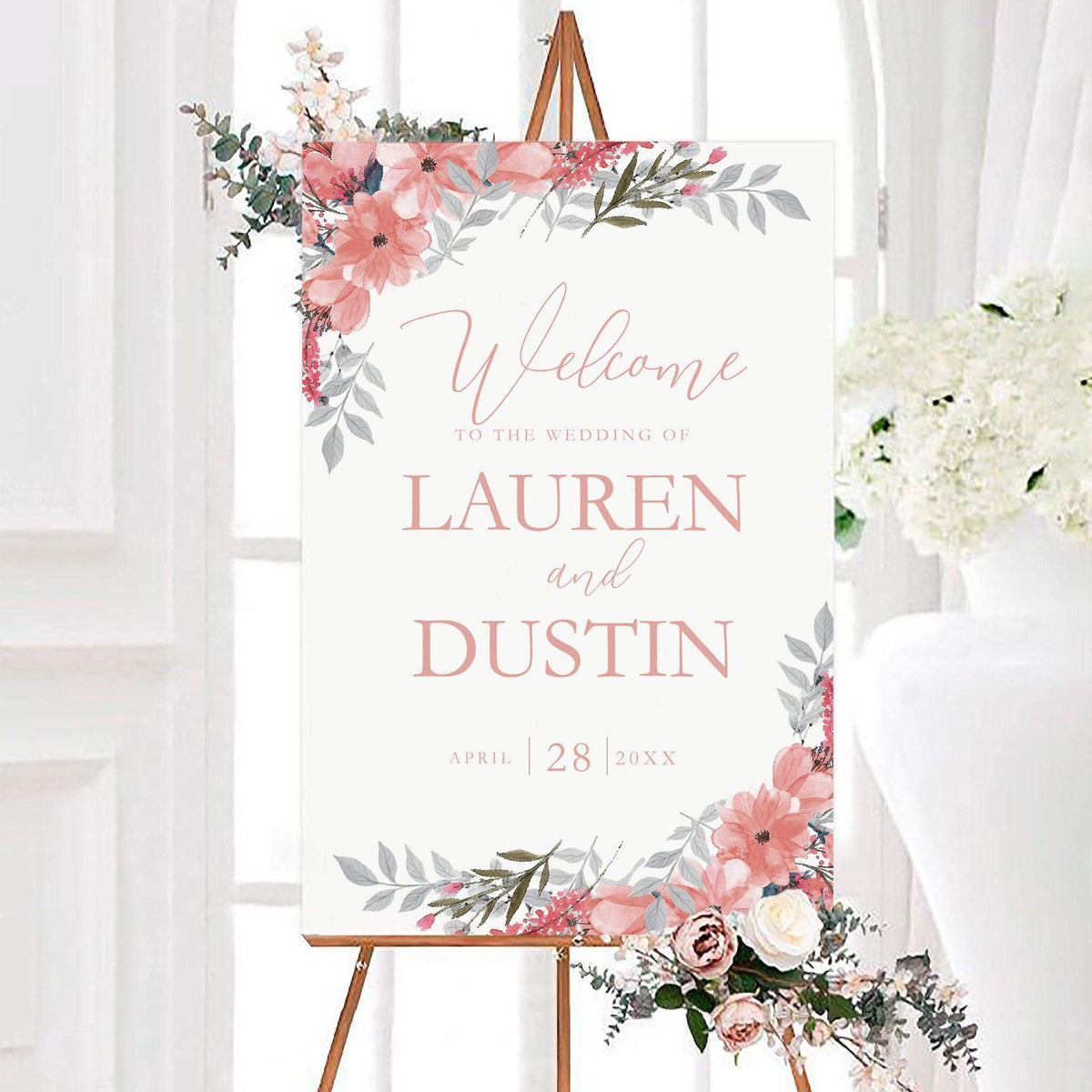 Personalized blush blooms floral wedding welcome sign featuring watercolor pink and coral flowers, soft botanical greenery, and elegant script lettering. The romantic wedding entrance sign includes customizable couple's names and wedding date surrounded by delicate floral corner arrangements.