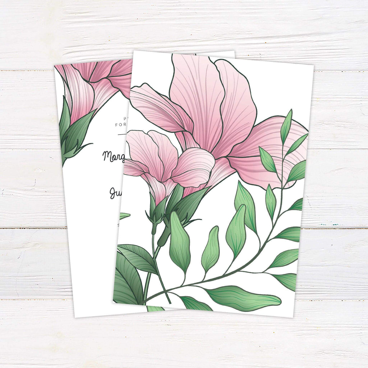 Elegant pink floral watercolor wedding invitation with green leaves, featuring customizable details for a spring or summer wedding celebration - back