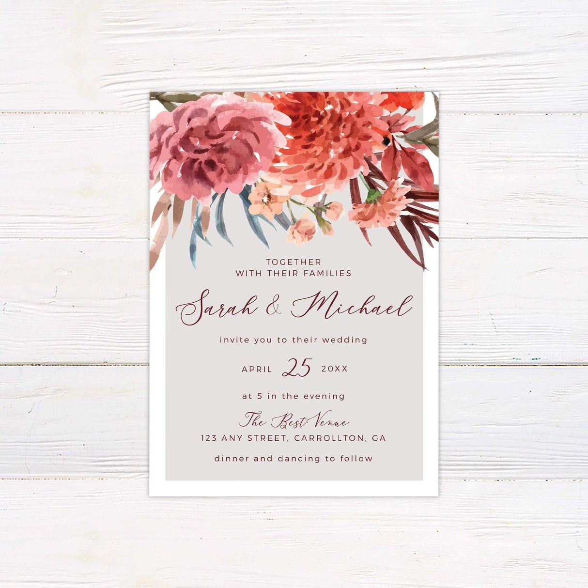 Wedding invitation with bold watercolor florals in pink and red, elegant script text, and a clean layout for a spring or summer celebration.