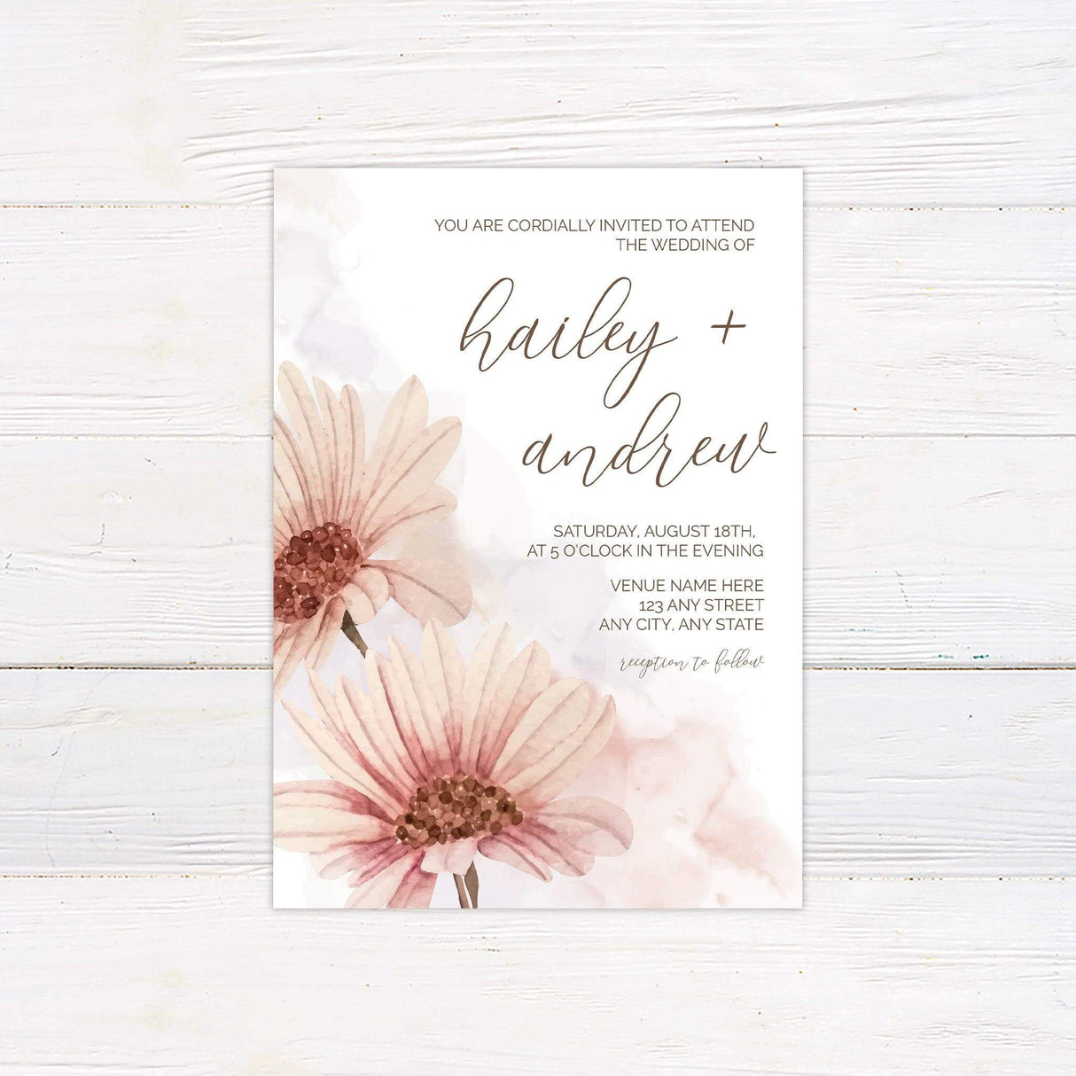 Soft pink daisy floral in the bottom left corner with mixed font wording on the right side. Watercolor floral wedding invitation with hand-painted daisy-inspired blooms and elegant script, perfect for spring and garden weddings.