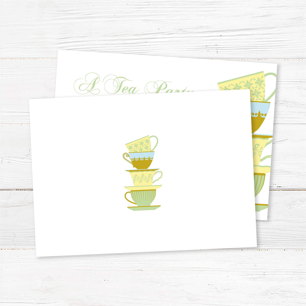 Elegant bridal tea party invitation featuring a stack of vintage teacups in soft green and gold hues. Customizable with the bride’s name, event details, and RSVP information. Back.