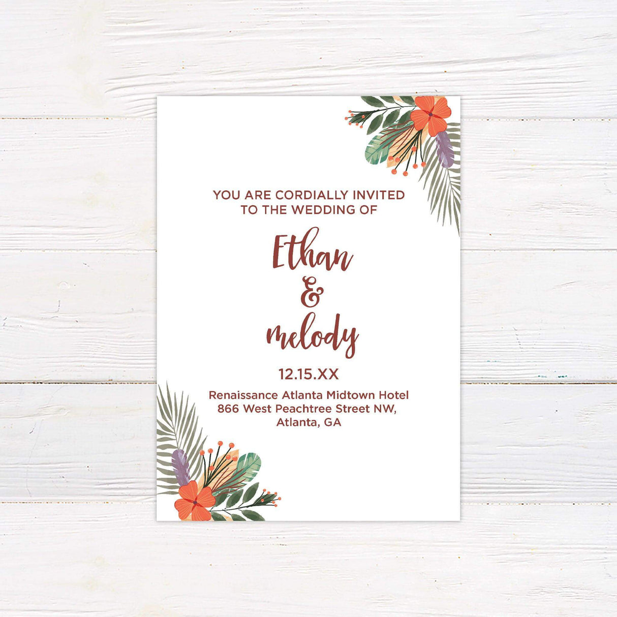 Boho tropical wedding invitation with botanical and floral illustrations, perfect for destination weddings or vibrant outdoor celebrations.