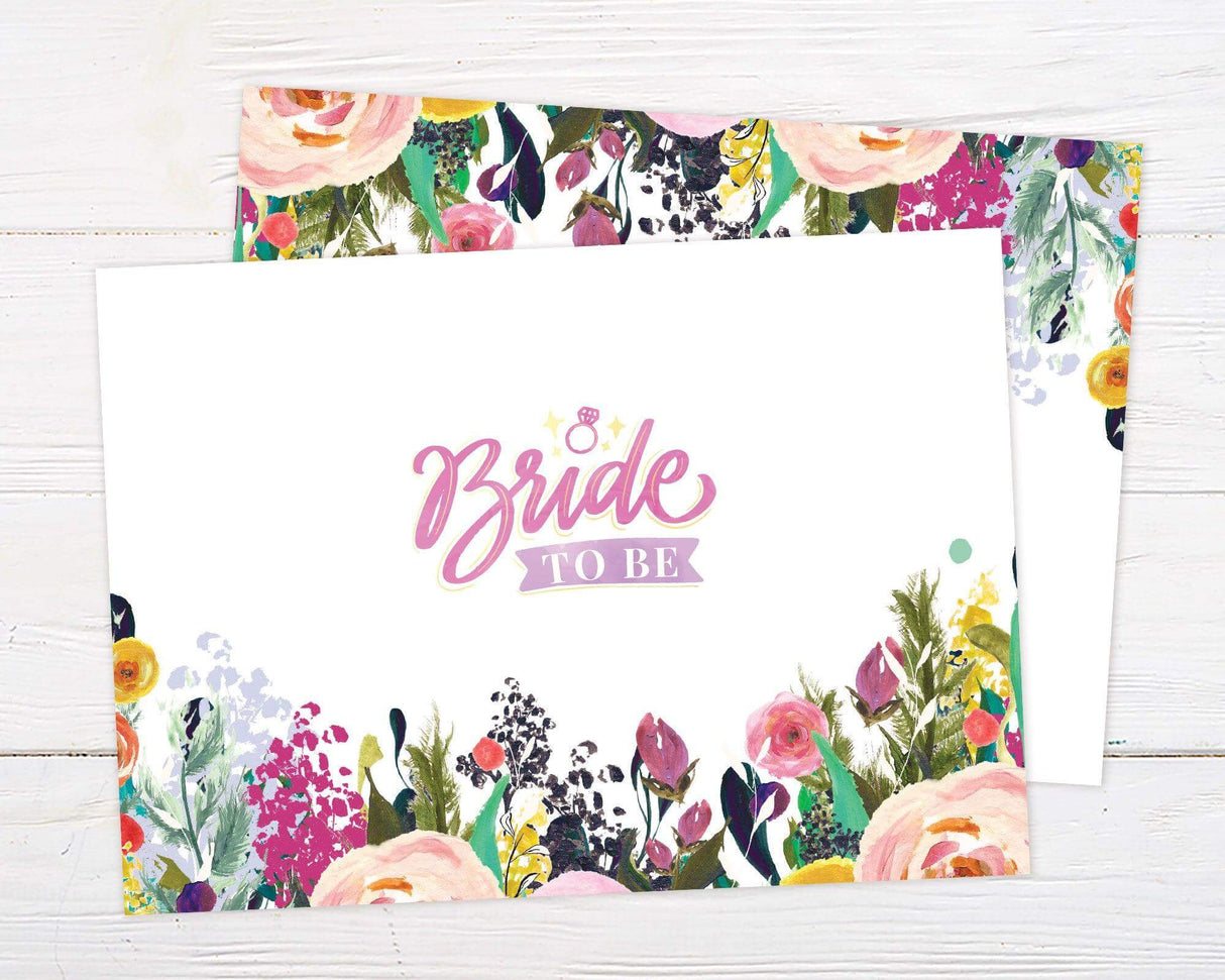 A bright floral bridal shower dinner invitation with colorful painted flowers at the top. The design features soft script text on a white background. - back.