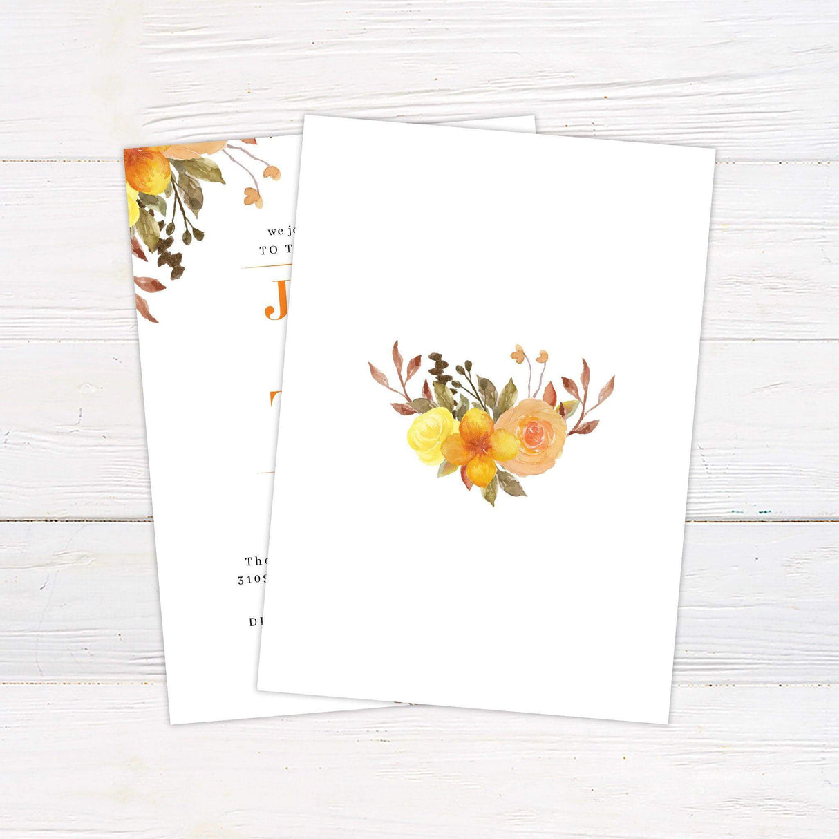 Elegant floral wedding invitation with hand-painted botanical accents and classic typography, ideal for traditional or garden weddings. back