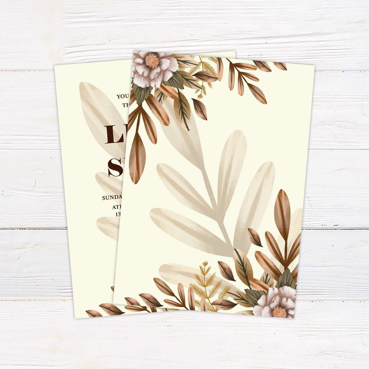 Boho botanical wedding invitation with earthy floral accents and elegant serif typography, ideal for garden or outdoor weddings. back
