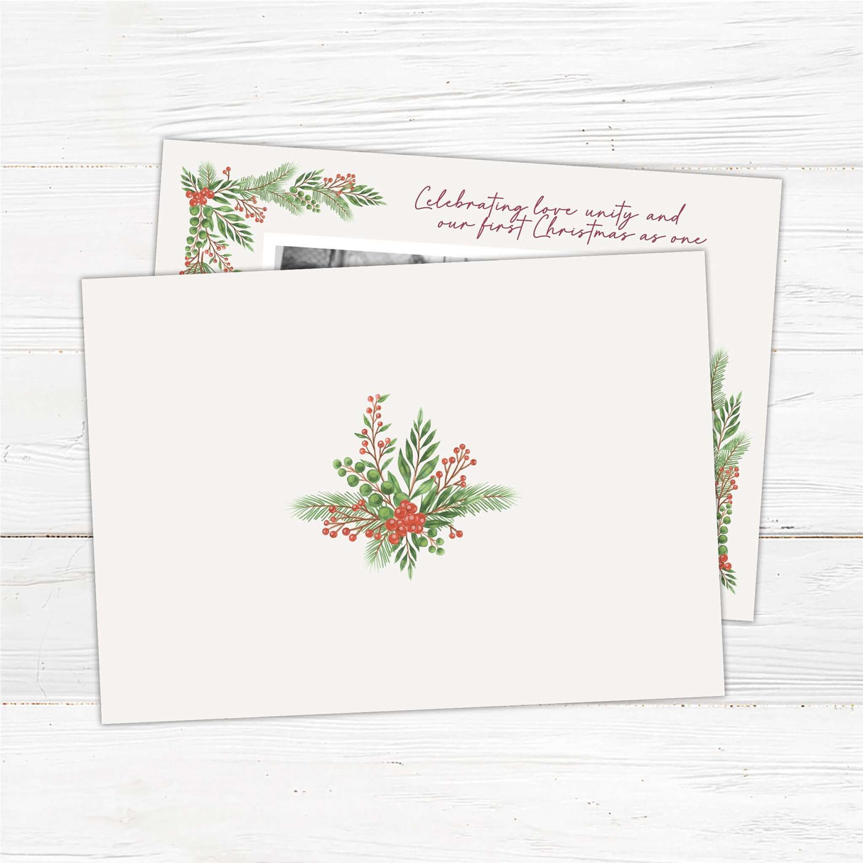Elegant wedding-themed Christmas card with photo of newlywed couple, holiday greenery, and personalized message. - back side