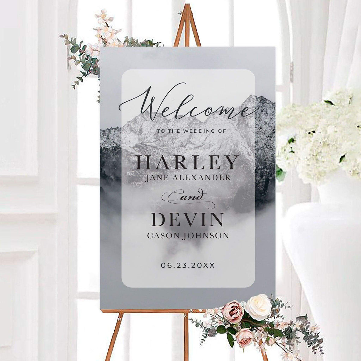 Personalized charcoal mountains wedding welcome sign featuring snow-covered peaks, misty forest scenery, and elegant charcoal script and serif lettering. The scenic wedding sign includes customizable couple's names and wedding date within a softly rounded rectangular design.