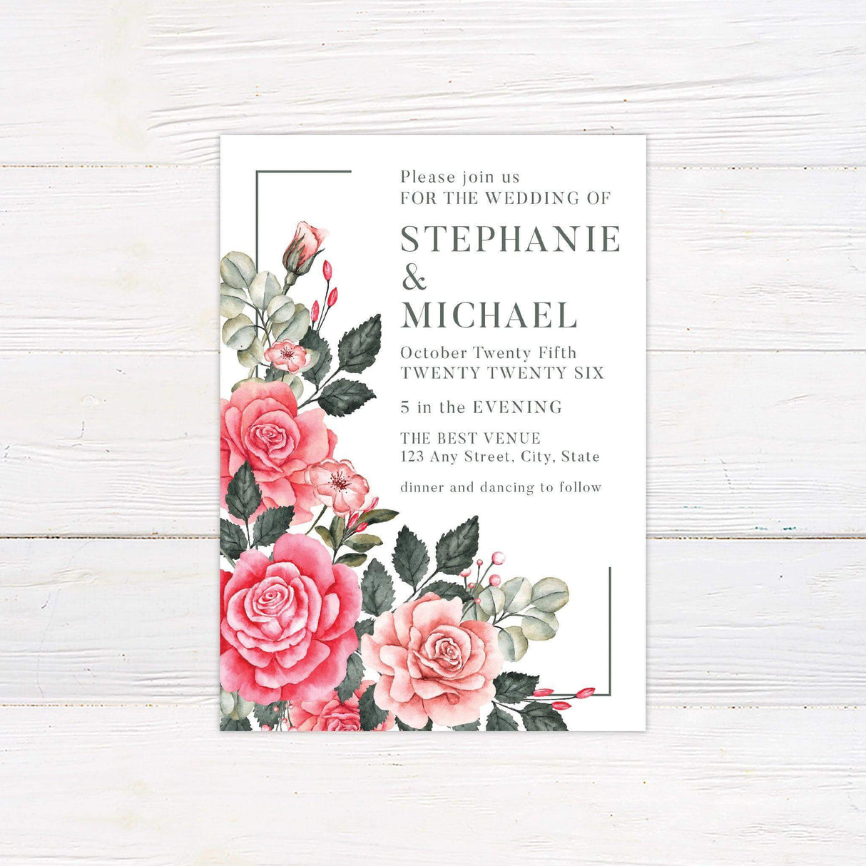 Wedding invitation with bold pink and blush watercolor roses, green foliage, and elegant serif fonts on a white background.