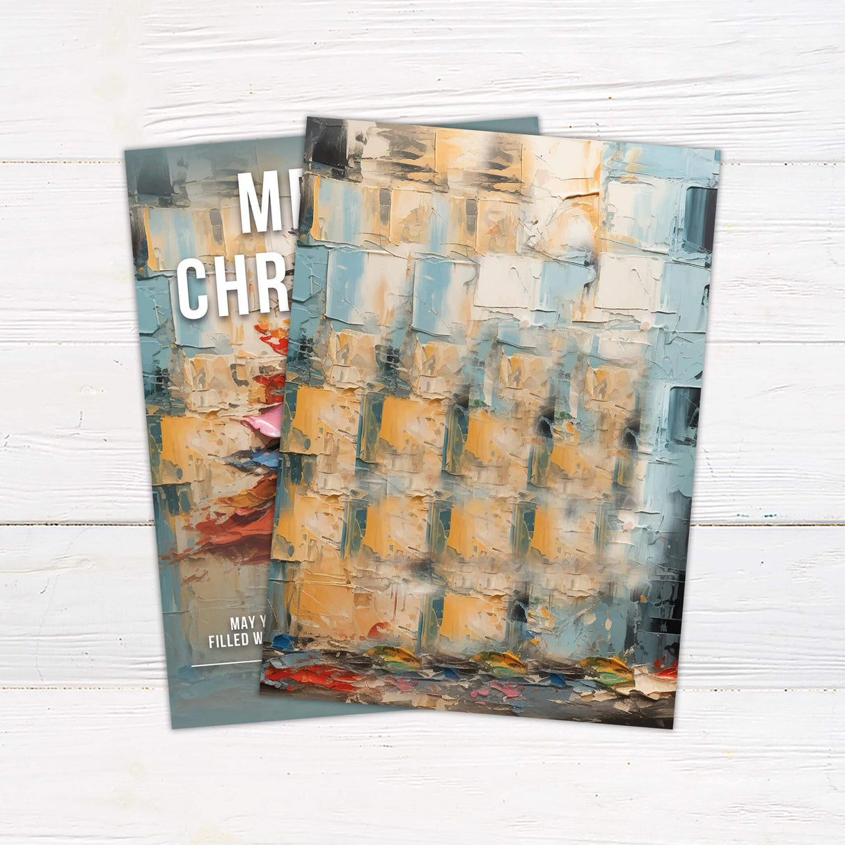 Holiday card with an abstract colorful Christmas tree and bold text reading “Merry Christmas.”
A festive Christmas card featuring modern artwork of a painted tree with space for a personalized family name. - back.