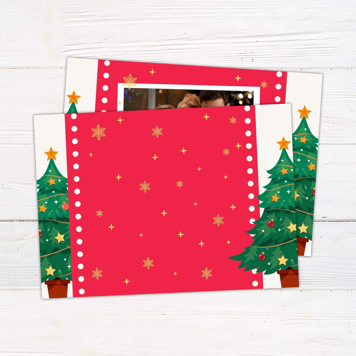 Christmas card with a customizable family photo framed by a bright red border, decorated Christmas trees, and a festive holiday greeting. - back.