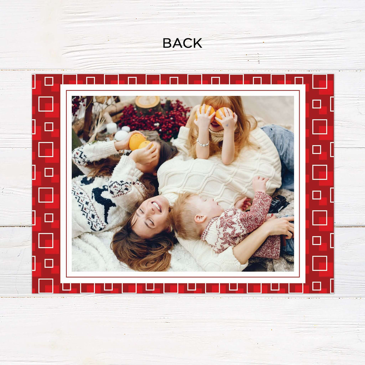 This festive photo card features a bold red square background with playful geometric accents and space for multiple photos. The gatefold layout includes cheerful holiday greetings and is fully customizable with your own images and message. - back.