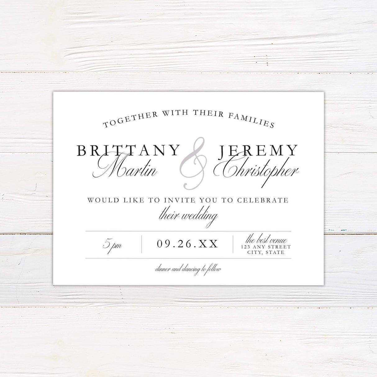 Classic wedding invitation with serif and script typography on a white background, minimalist layout with arched text and divider lines.