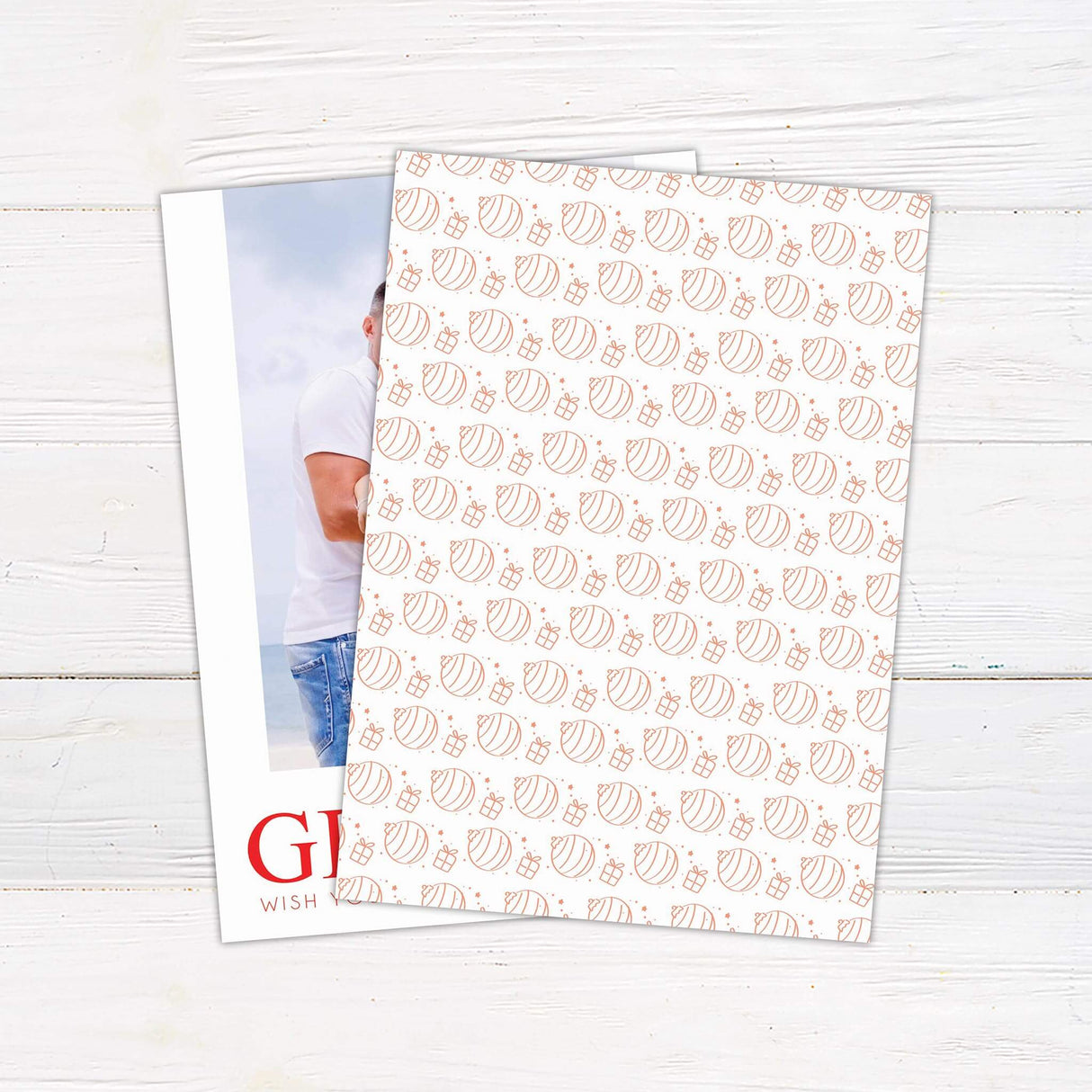 Christmas card with a full customizable photo layout featuring bold red typography of the family name and a festive holiday greeting at the bottom. - back.