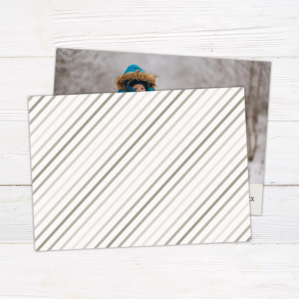 Minimalist holiday card design with a large customizable photo and a simple cream banner featuring Merry Christmas text with family name and year. - back.