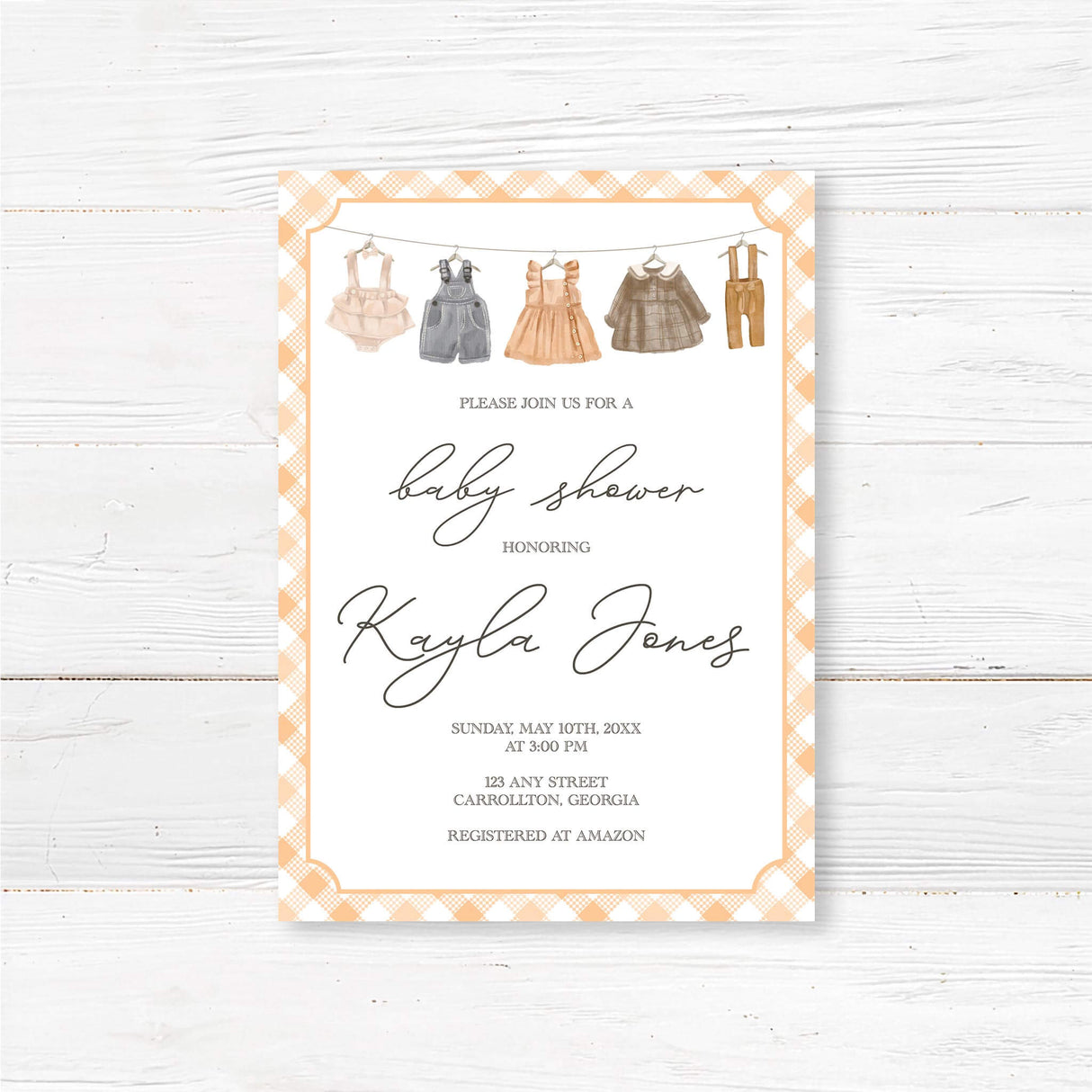 Printed rustic baby shower invitation featuring a vintage baby clothesline illustration and a peach gingham border. Perfect for a country or farmhouse baby shower.