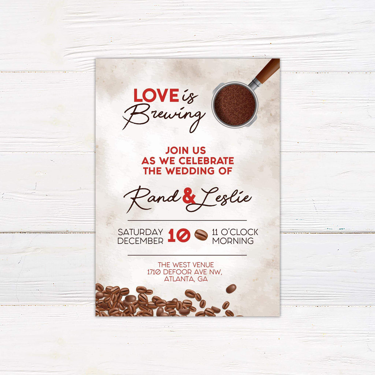 Coffee-themed wedding invitation with “Love is Brewing” text, coffee beans, espresso portafilter, red and brown fonts, and rustic background