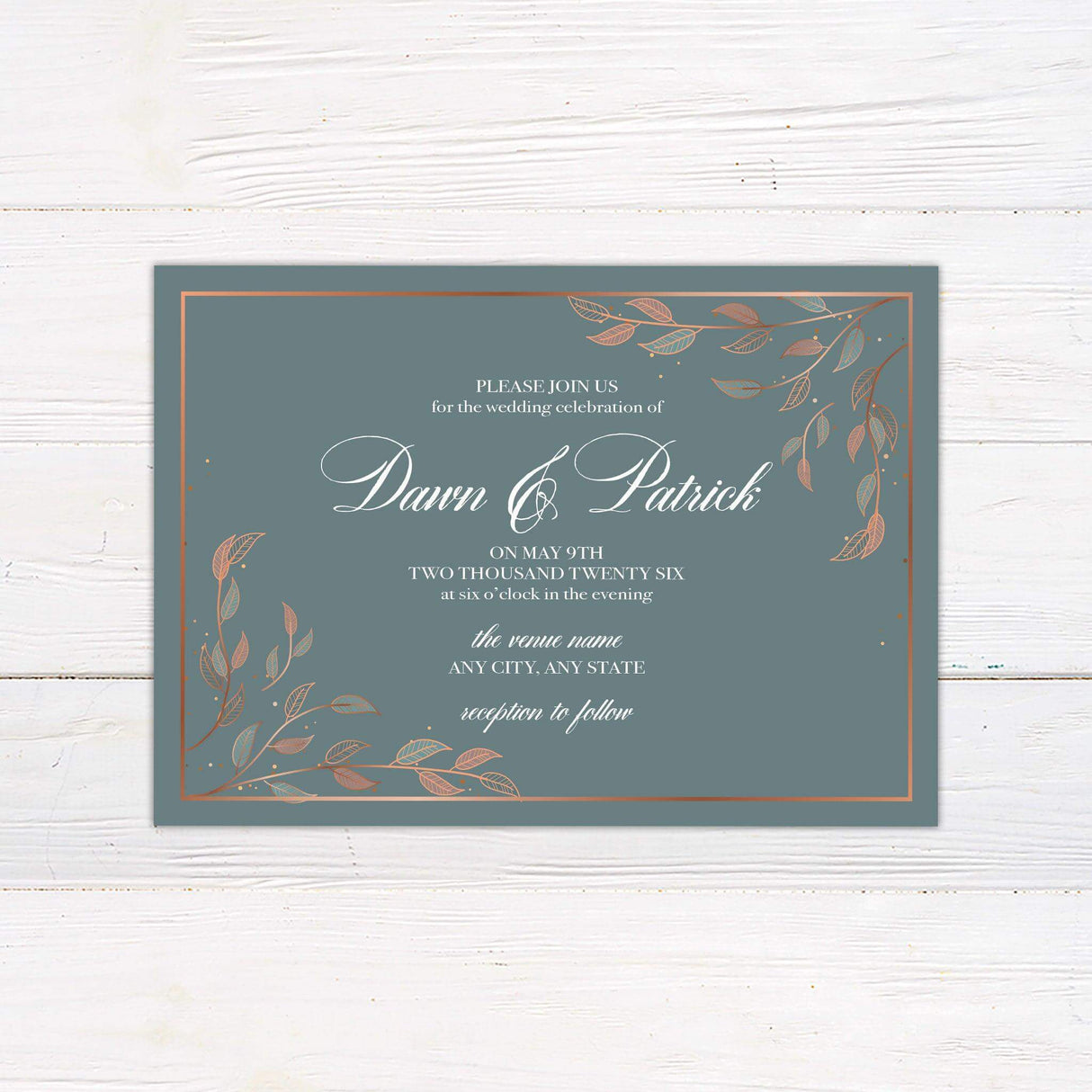 Teal wedding invitation with copper leaf illustrations, metallic border, romantic script typography, and botanical corner accents